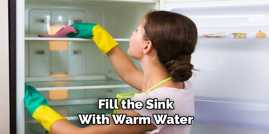 Fill the Sink
With Warm Water