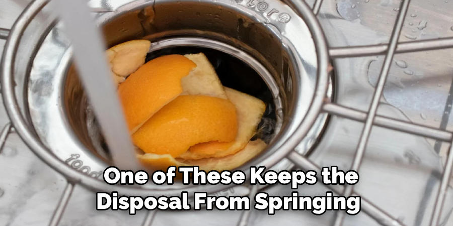  One of These Keeps the
Disposal From Springing