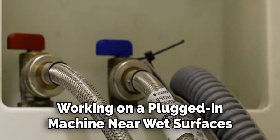 Working on a Plugged-in
Machine Near Wet Surfaces
