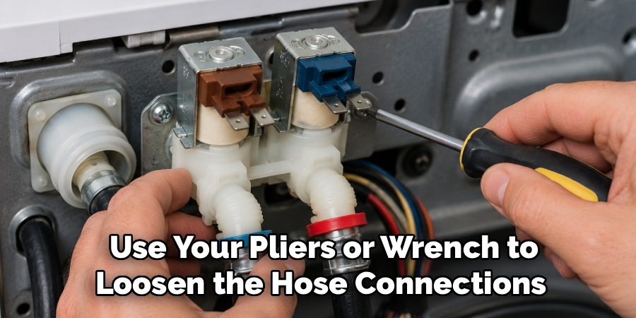  Use Your Pliers or Wrench to
Loosen the Hose Connections